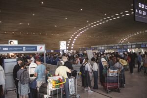 Europe Summer Travel 2026 passengers arriving at a busy European airport