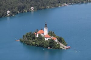 Lake Bled Slovenia aerial view with island church and alpine scenery