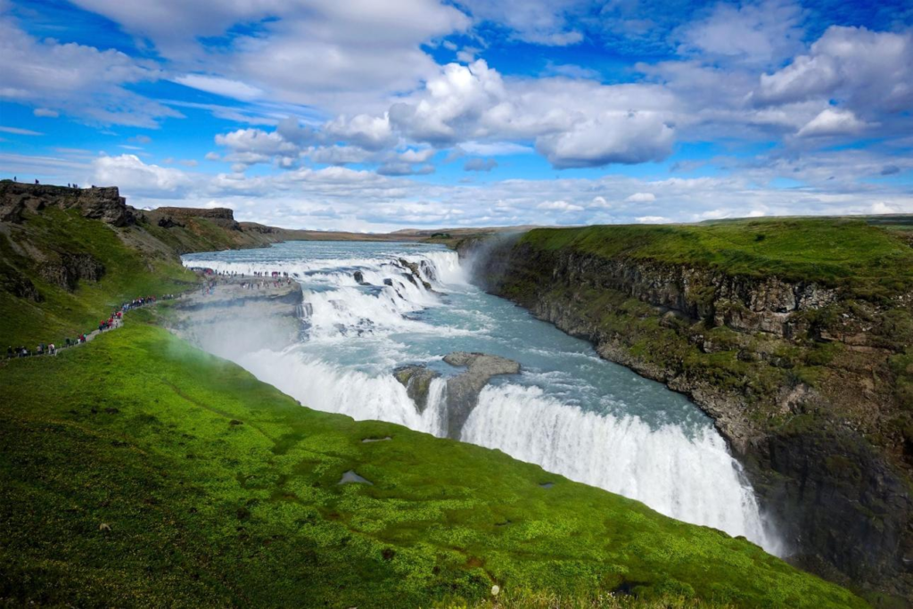 Waterfall and volcanic landscape in Iceland during summer