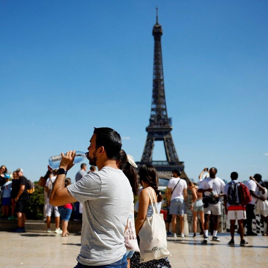 Tourist staying hydrated during hot weather in Europe