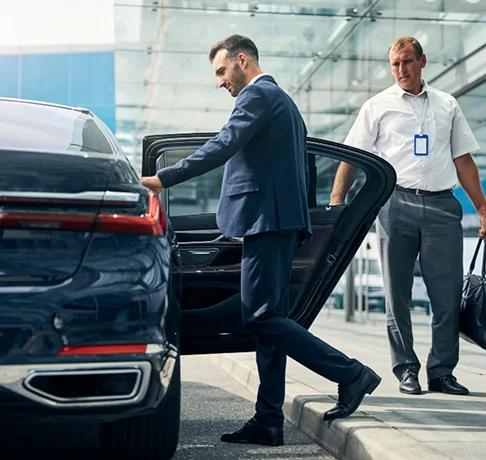 Business traveler using a chauffeur service in Europe