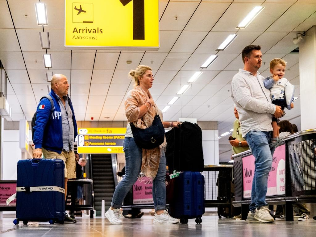Travelers arriving at a European airport