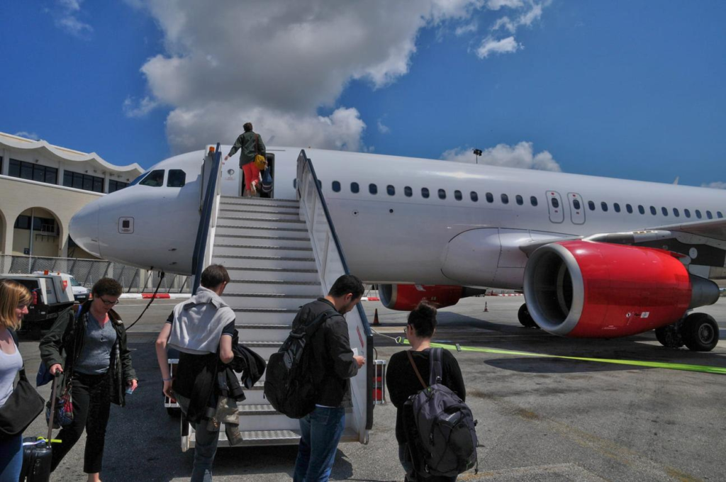 Passenger boarding a flight in Europe